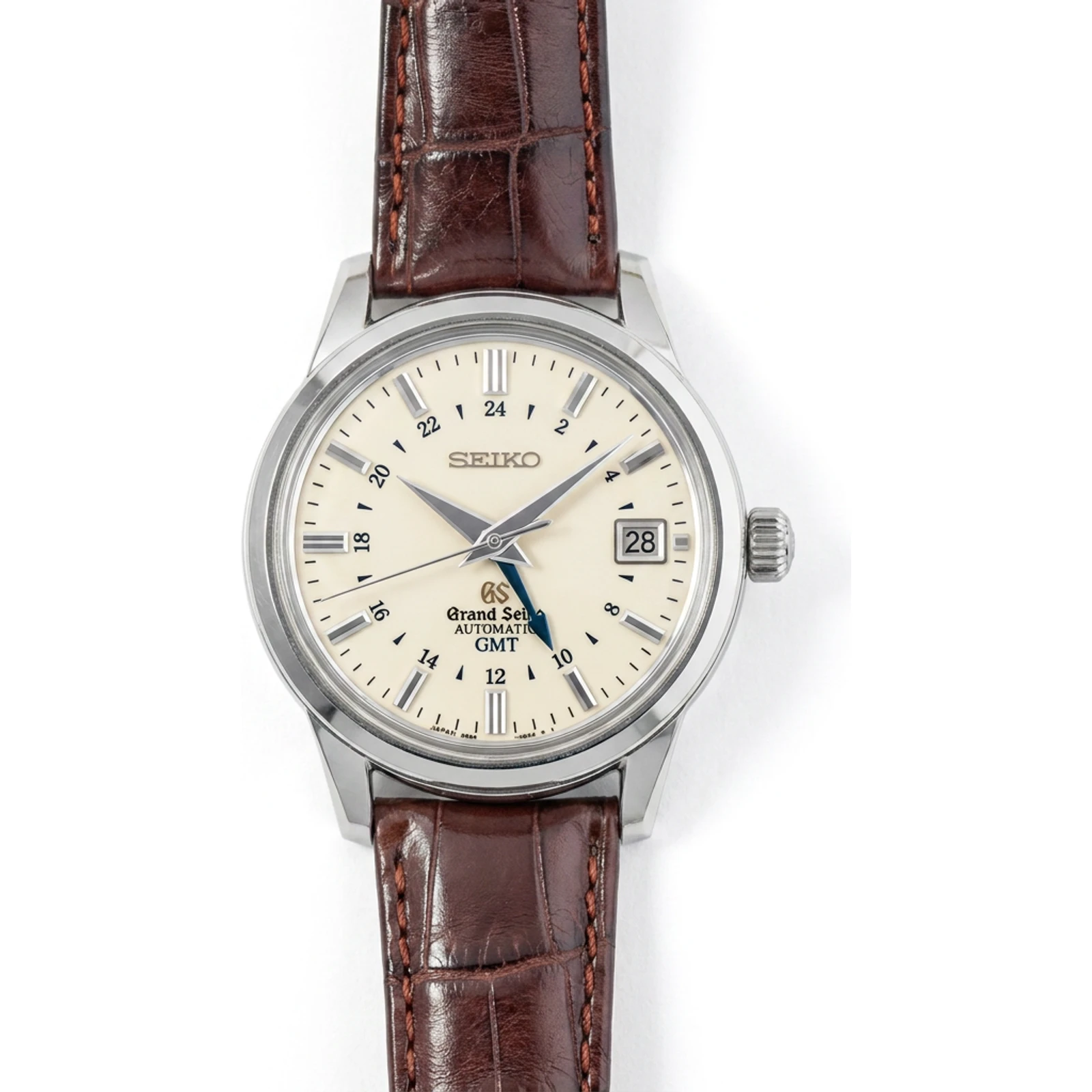 Grand Seiko GMT, 62GS-inspired case, Seiko logo at 12 SBGM021