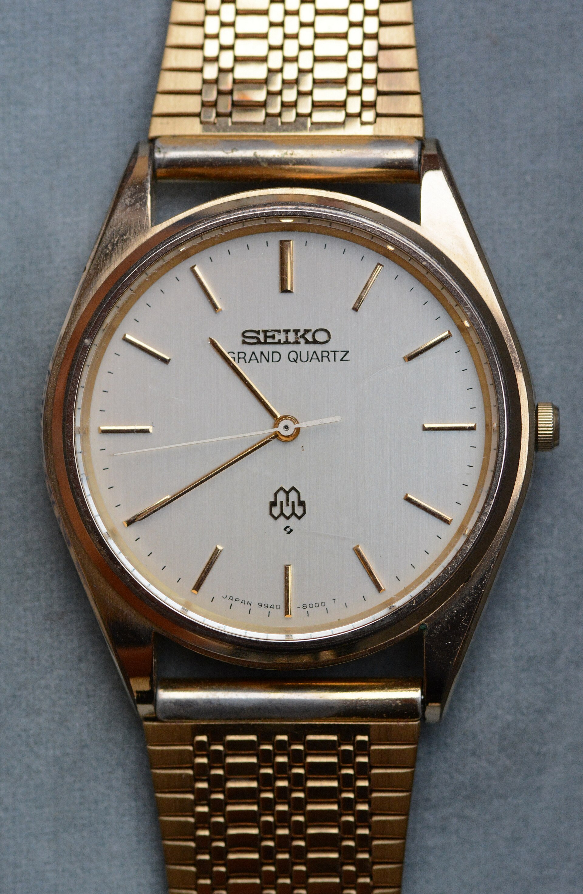 A gold-toned 1979 Seiko Grand Quartz with a Twin Quartz dial on a gold bracelet