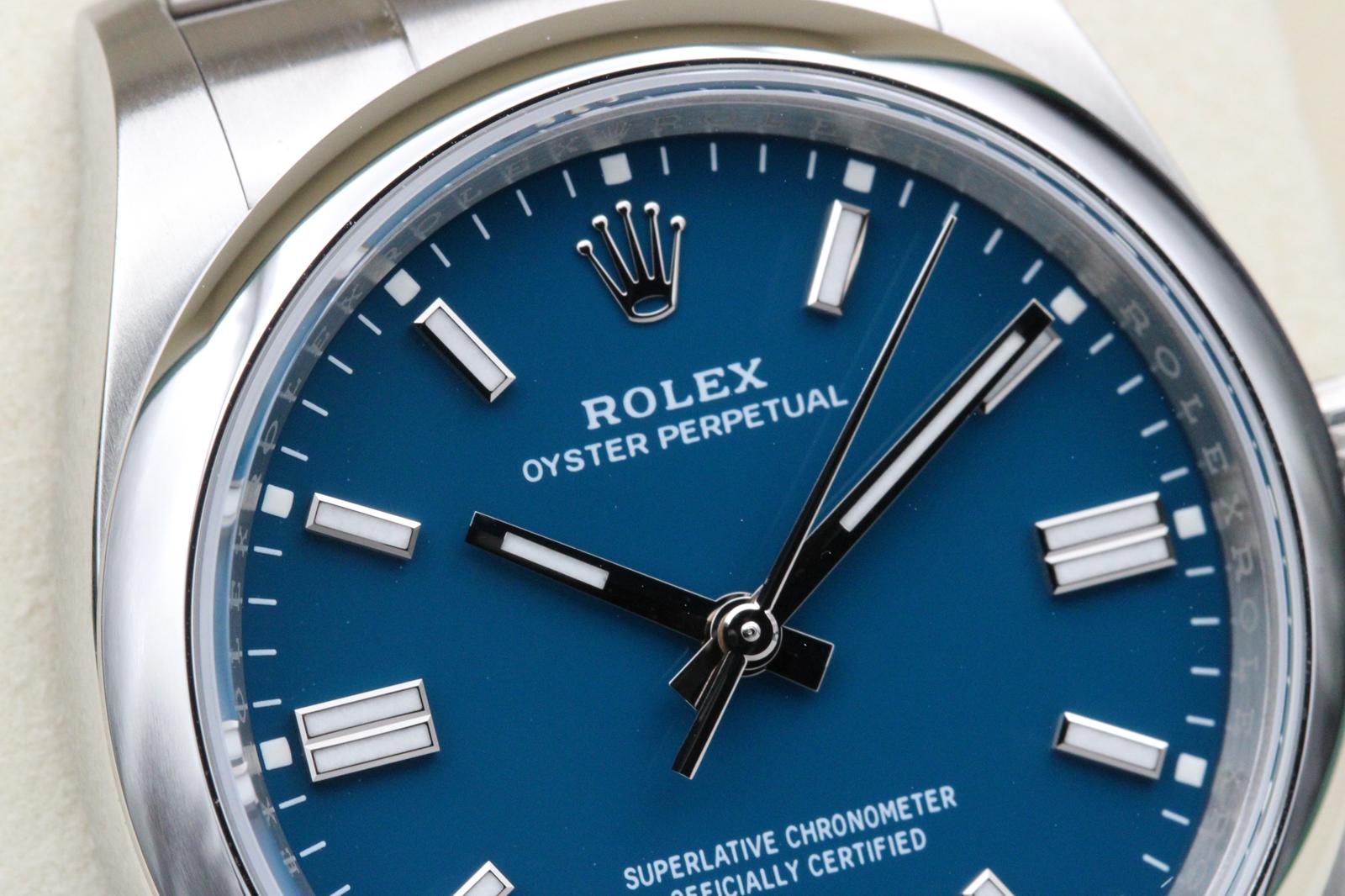 Close-up of the bright blue dial of a Rolex Oyster Perpetual 36 reference 126000