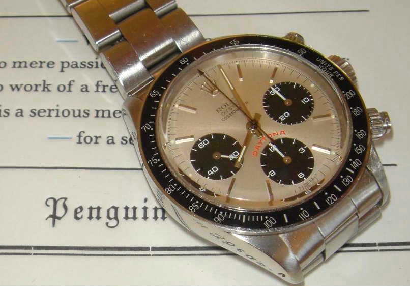 A steel Rolex Daytona 6263 with a silver dial, black subdials and the word Daytona printed in red