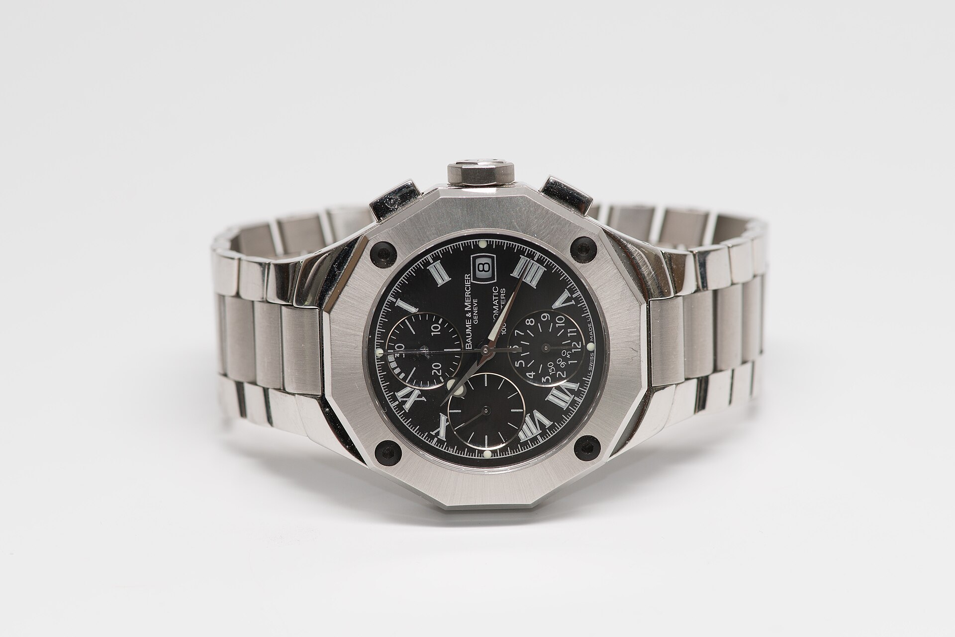 A steel Baume & Mercier Riviera chronograph with a twelve-sided bezel and black dial