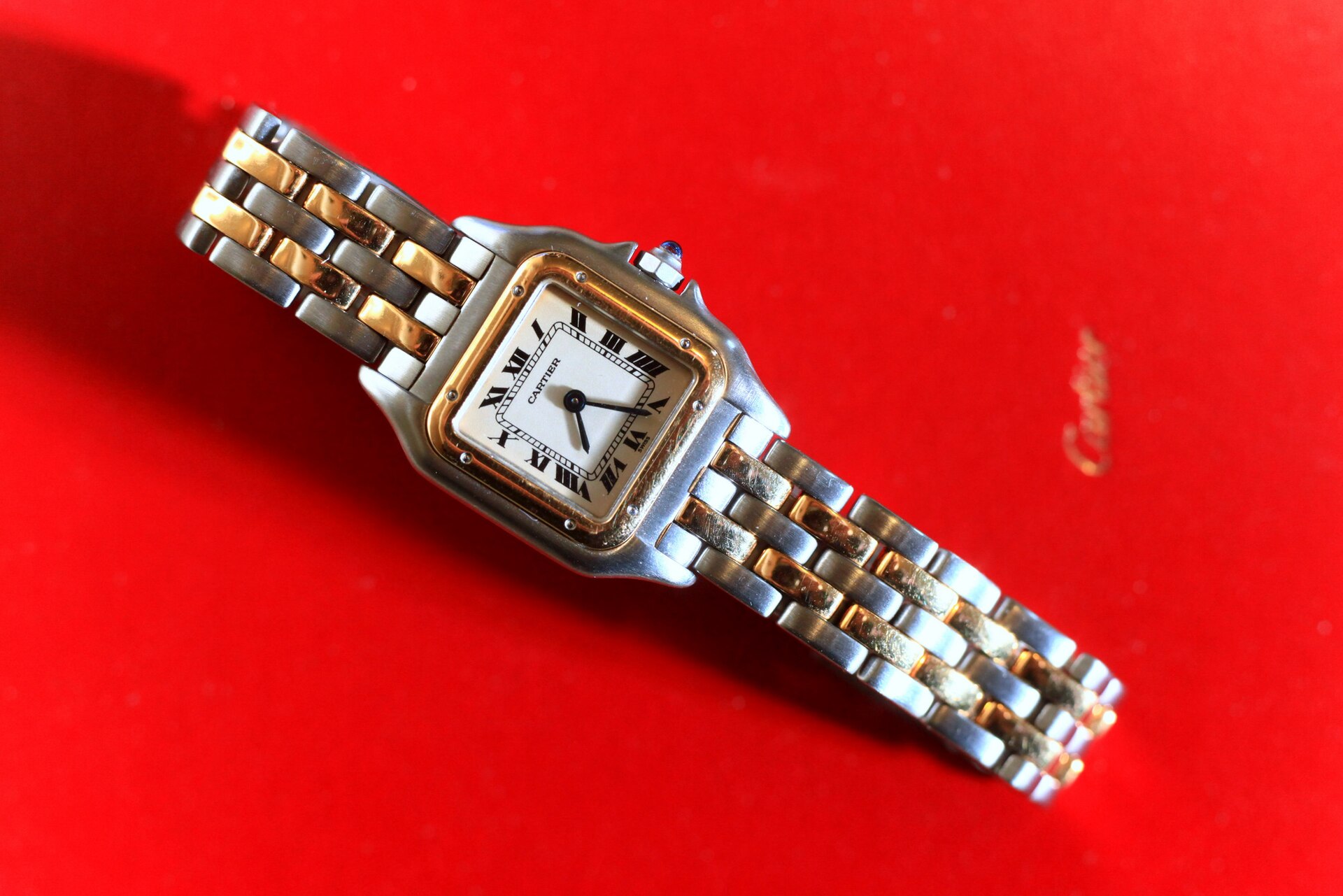Two-tone Panthère de Cartier wristwatch with its multi-link bracelet