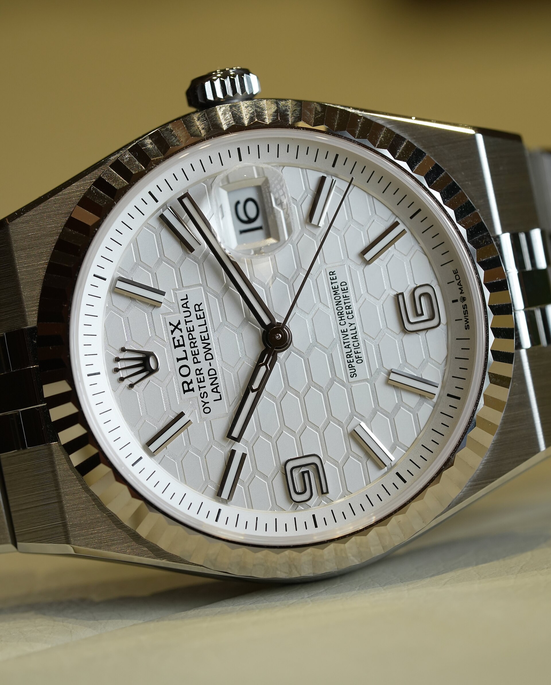 Close-up of a Rolex Land-Dweller honeycomb dial